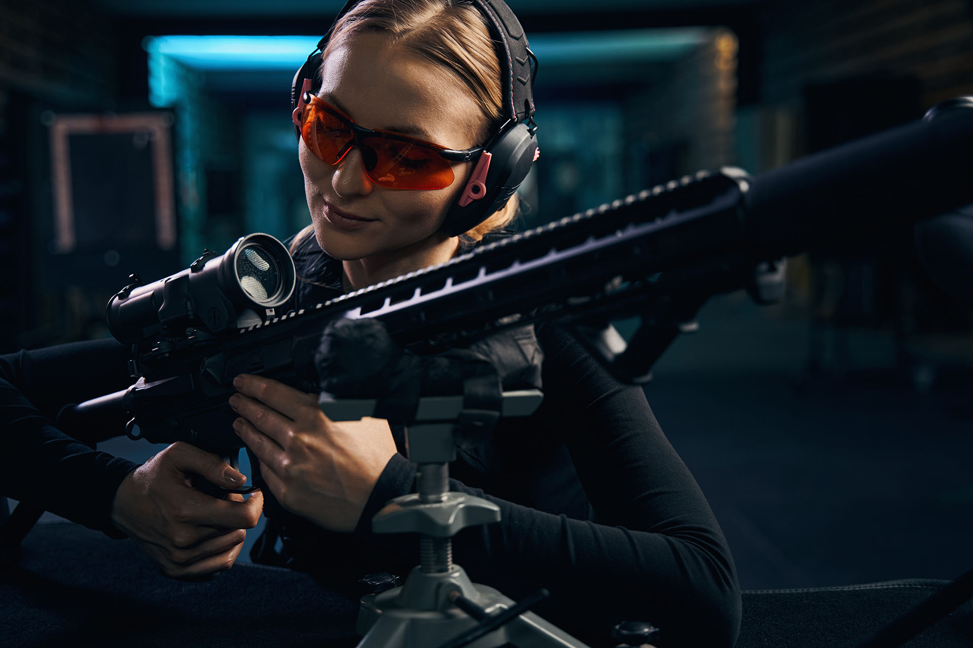 female sniper in safety glasses and headphones ins 7ZTDQVF